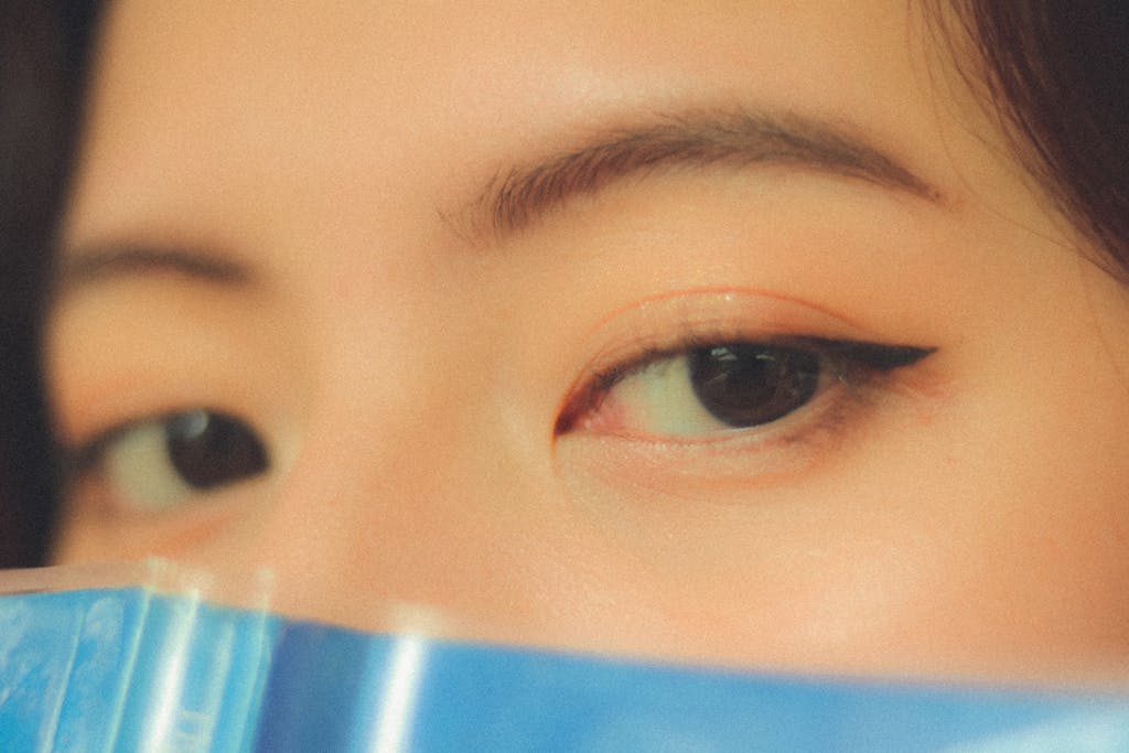 A captivating close-up image of a woman's eyes with striking eyeliner, creating an intense gaze.