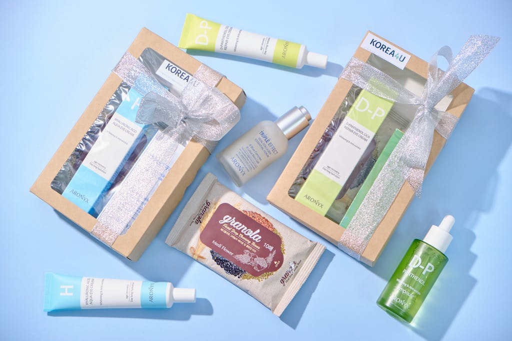 Beautifully arranged skincare gift sets with elegant ribbon packaging, perfect for a special occasion.